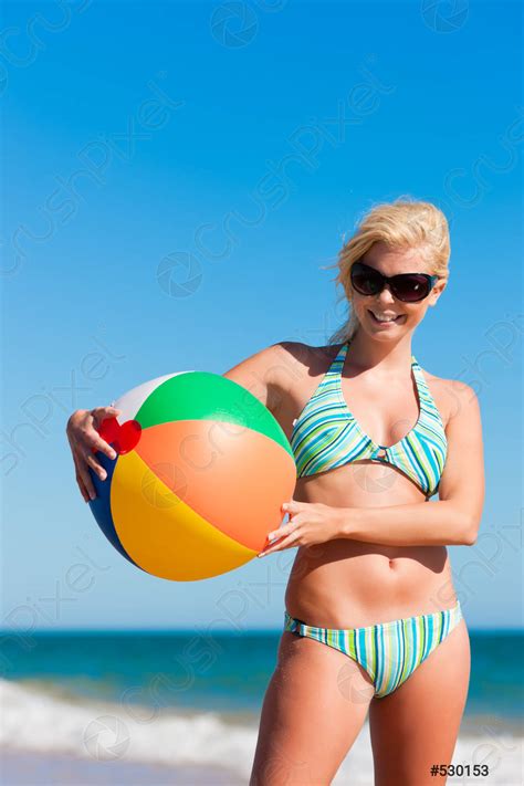 Attractive Woman in bikini on beach - stock photo 530153 | Crushpixel