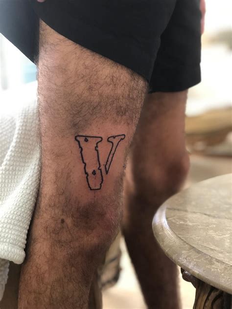 Vlone Tattoo | V tattoo, Hand tattoos for guys, Simple leg tattoos