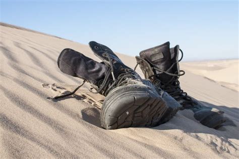 Boots in sand stock photo. Image of boots, used, horizontal - 35700530