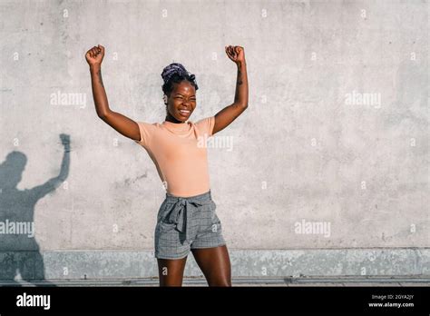 Girl victory pose hi-res stock photography and images - Alamy