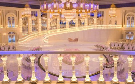 an elaborately decorated ballroom with chandeliers and tables