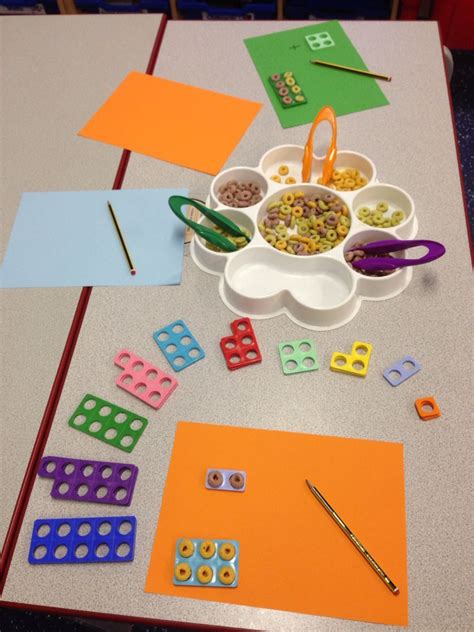 Using wheat hoops to fill in the Numicon spaces- helps support understanding of conservation of ...