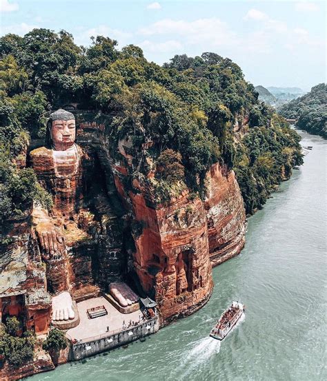 Leshan Giant Buddha is 71 metres tall and has 8.3 metre long fingers ...