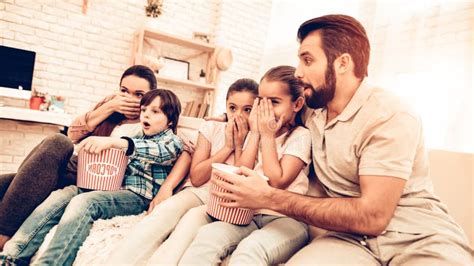 Cheerful Family Watching Scary Movie at Home Stock Photo - Image of remote, childhood: 131020918