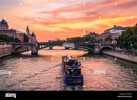 The Seine River at sunset. During the summer heatwave of 2018, Paris ...