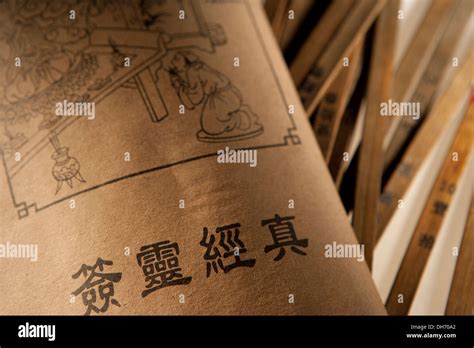 Chinese fortune telling book and sticks Stock Photo - Alamy