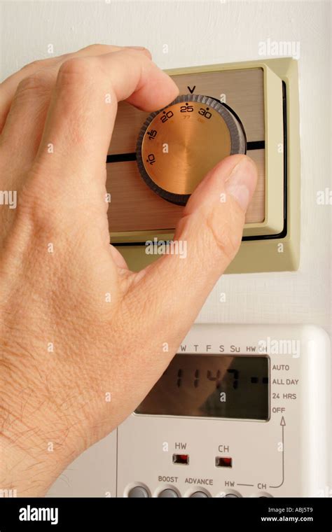 Setting a thermostat Stock Photo - Alamy