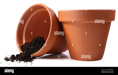 Clay flower pots and soil, isolated on white Stock Photo - Alamy