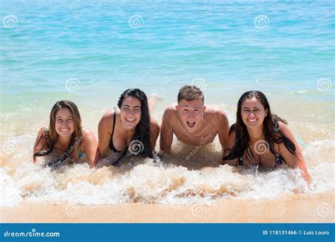 Young People Having Fun at the Beach Stock Photo - Image of faces, laying: 118131466