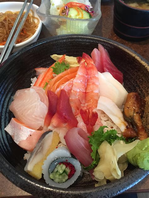 [I ate] Chirashi bowl with assorted sashimi and seafood on top of ...