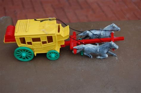 Vintage Hardy Plastic Stagecoach action toy. Made in New York, 1940's. Includes great original ...