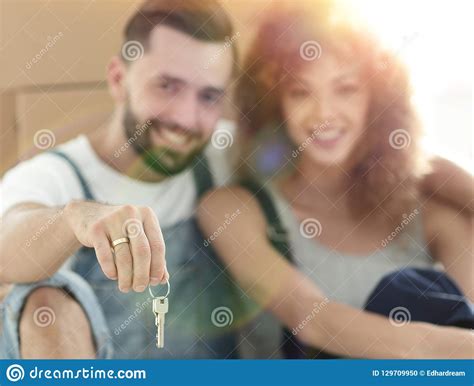 Close-up of a Young Couple on a Background of Cardboard Boxes Stock Photo - Image of indoors ...