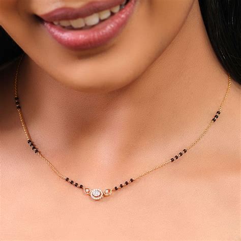 Amani Diamond Mangalsutra - Best In Class Mangalsutra Design|CaratLane | Black beads mangalsutra ...