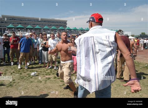 Fighting in the infield of Kentucky Derby Stock Photo - Alamy