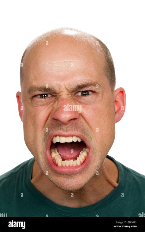 Angry and mad man screams with his mouth wide open showing his rage Stock Photo - Alamy