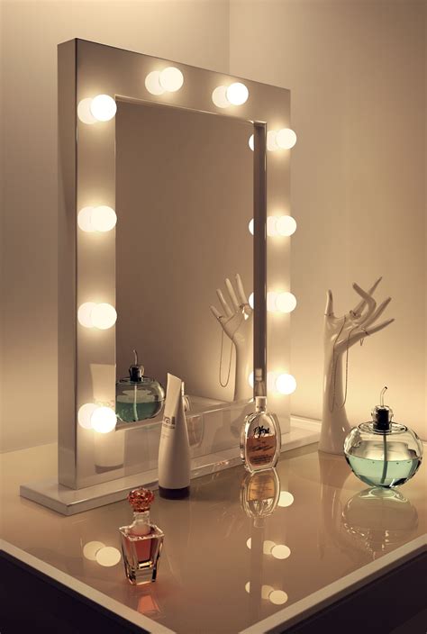 Vanity mirror with light bulbs around it | bluetoothmusicshower