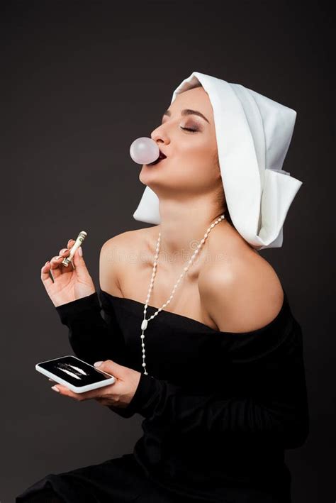 Laughing Nun With Bubble Gum Holding Dollar Banknote And Smartphone With Cocaine Lines Stock ...
