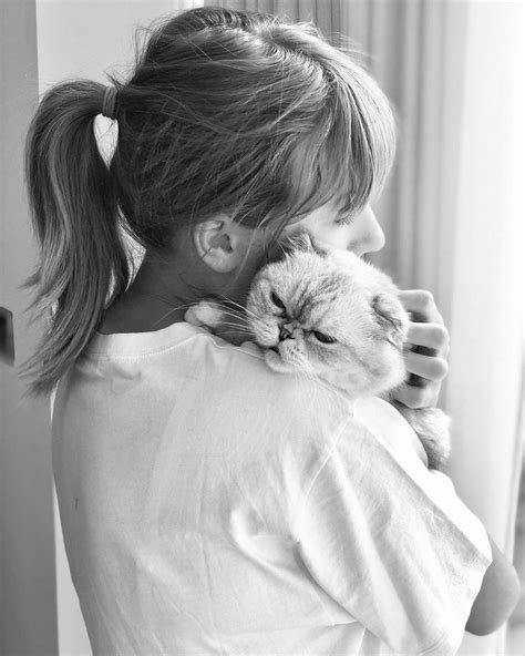 Hold Me Close from Taylor Swift's Cutest Cat Photos | E! News
