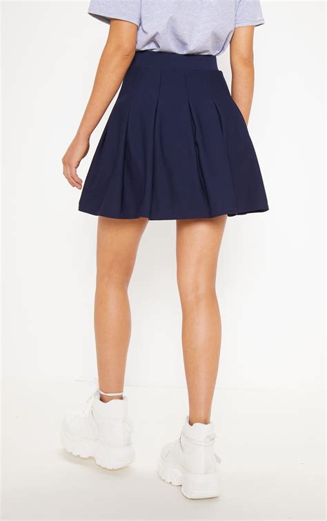 Navy Pleated Tennis Skirt | Skirts | PrettyLittleThing CA