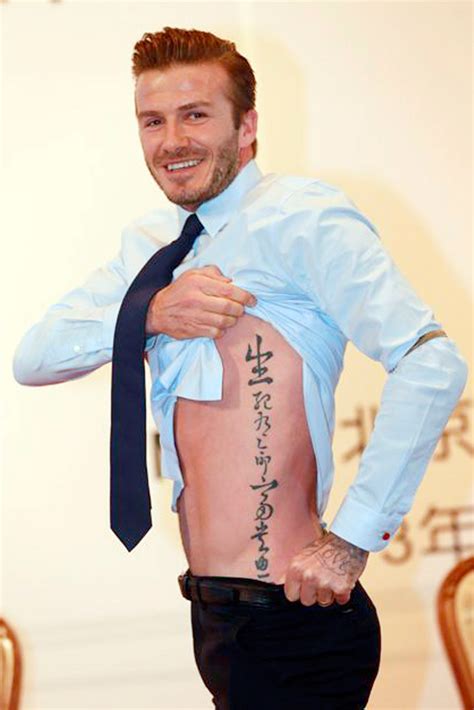 David Beckham Flashes His Flesh To Show Off New Chinese Tattoo | Marie Claire UK