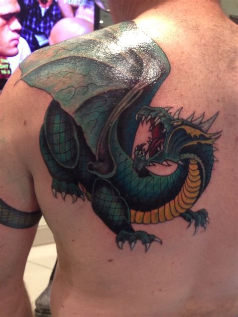 angry-winged-dragon-tattoo-on-left-back-shoulder | Dragon tattoo ...