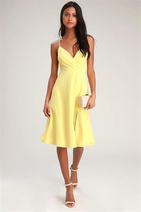 Maribelle Pale Yellow Surplice Midi Dress | Yellow occasion dresses, Yellow bridesmaid dresses ...