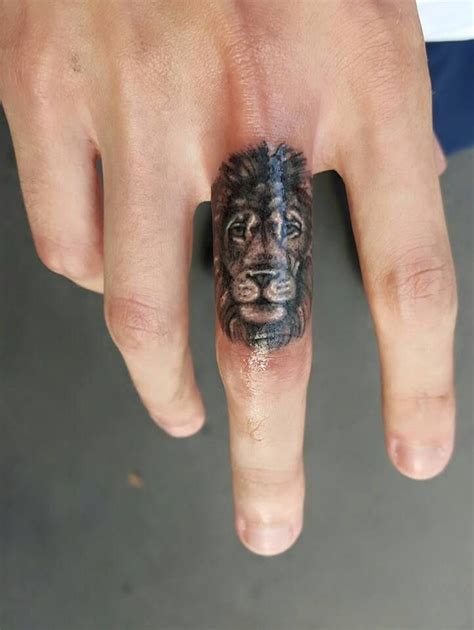 12+ Best Lion Tattoo Designs For Fingers | PetPress | Lion tattoo on ...