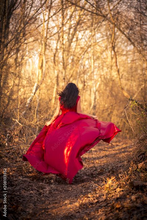 Woman In Red Dress Running