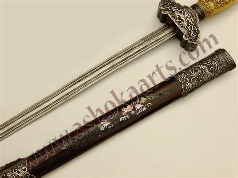 Very Fine Vietnamese Kiem sword with carved handle and silver mounts ...