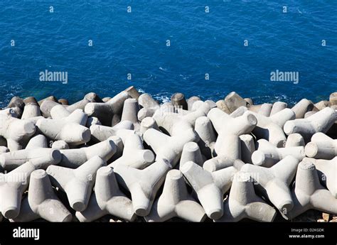 Breakwater of massive concrete Tetrapods Stock Photo - Alamy