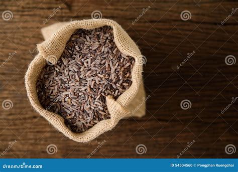 Brown rice in sack bag stock photo. Image of background - 54504560