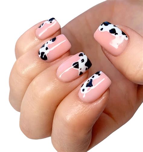 Trendy summer cow print nail design