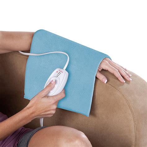 This $20 Heating Pad Is Beloved By People With Menstrual Cramps And ...