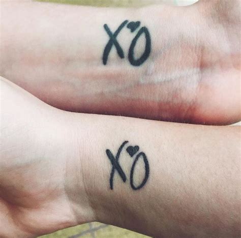 Pin by n h on Tattoos | Xo tattoo, Small wrist tattoos, Artsy tattoos