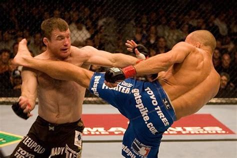 Road to Toronto: Georges St. Pierre knocks out Matt Hughes to become ...