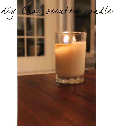 a candle sitting on top of a wooden table