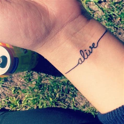 Brief heartbeat alive quote tattoo on arm - Tattooimages.biz