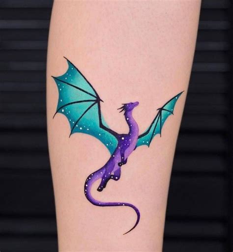 a purple and blue dragon tattoo on the right leg, with stars in the background