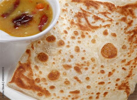 Roti canai or roti cane is a type of Indian-influenced flatbread found in Malaysia, Brunei ...