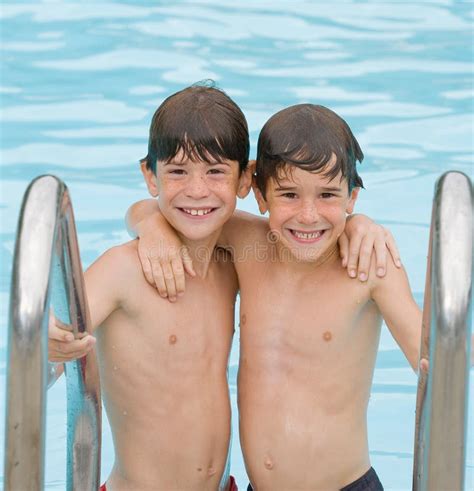 Two Boys at the Pool stock image. Image of childhood, happiness - 5613089