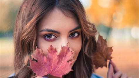 Girl Model With Autumn Leaf Standing In Colorful Blur Bokeh Background Girls HD wallpaper | Pxfuel