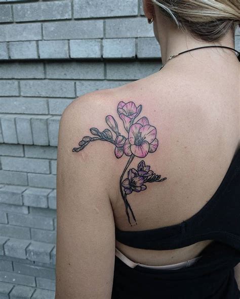 22 Beautiful and Delicate Freesia Tattoo Designs | TattooAdore