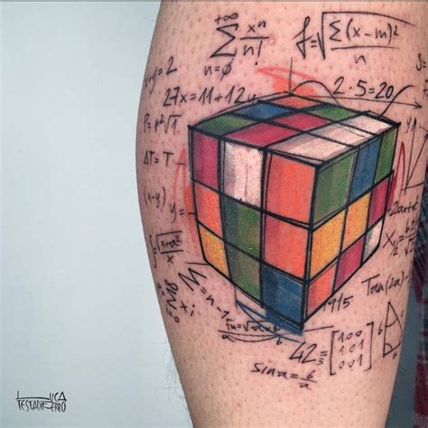 Rubik's cube tattoo done on the shin, sketchy style.