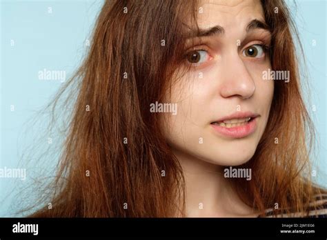 winter hairstyle static hair care stressed woman Stock Photo - Alamy