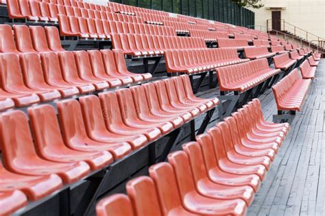 Bright brown stadium seat stock photo. Image of amphitheater - 59535902