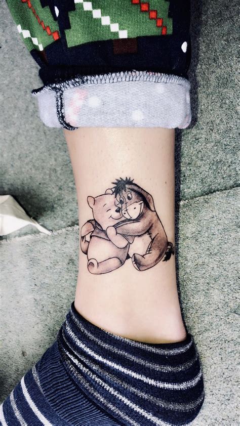 Sweet little Winnie-the-Pooh tattoo done by Jon @ Atomic tattoos, Oxford. : r/tattoos