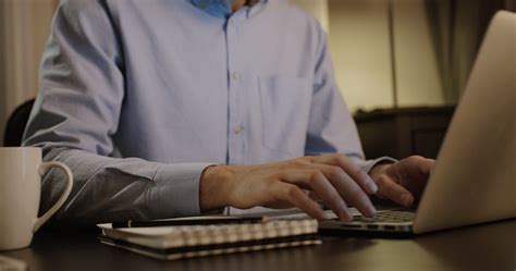 Business man typing on his laptop. Young man is working in office at computer at Stock Footage,# ...