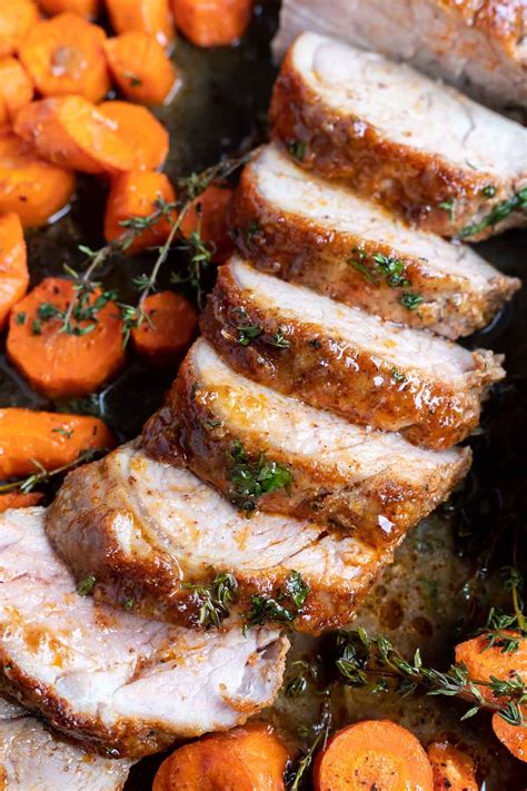 sliced pork with carrots and parsley on the side