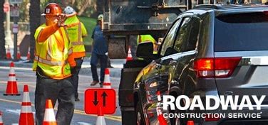 A Look at Traffic Control Flaggers - Roadway Construction Service