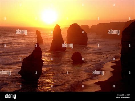 Sunset at The Twelve Apostles in Australia Stock Photo - Alamy